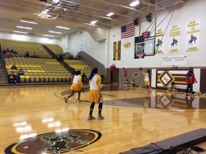 Buster women warming up before Saturday night's border war