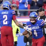 Devin Neal scores 4 times, Kansas beats No. 16 Colorado 37-21 as Buffs’ Big 12 title hopes take hit